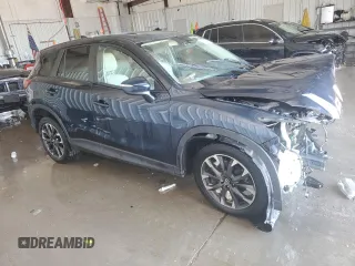 2016 Mazda CX-5 Grand Touring with VIN JM3KE4DY7G0735576, listed as a Copart auction lot 41916395 with 0 mi miles and Non Repairable. Bid and sale history available at carsss.com. Image 4.