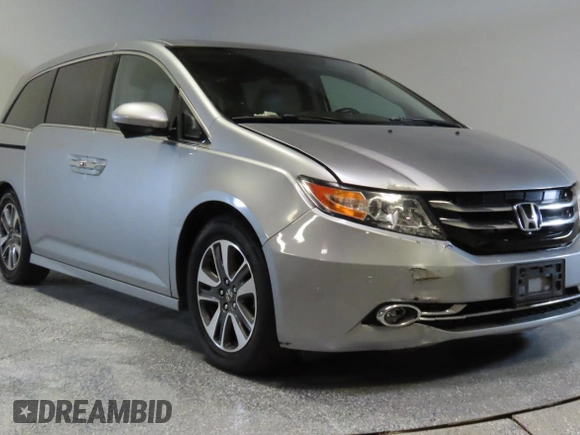 2016 Honda Odyssey Touring Elite с VIN 5FNRL5H98GB088791, выставлен на аукционе Copart как лот 59630465 с пробегом 88 100 миль миль и Списание • Salvage title. История ставок и продаж доступна на DreamBid. Изображение 1.