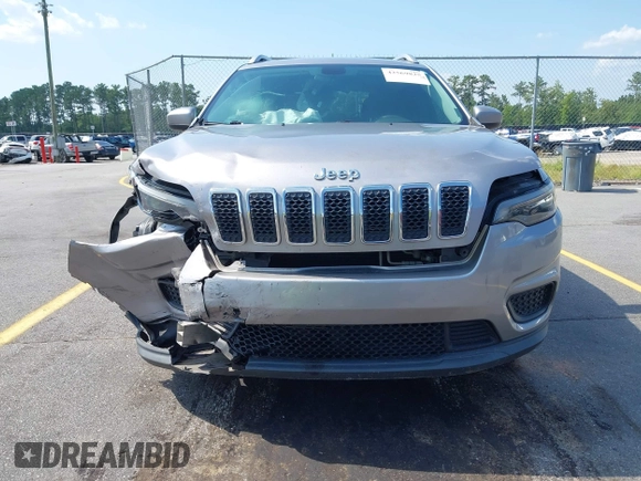2020 Jeep Cherokee Latitude z VIN 1C4PJLCB3LD615147, wystawiony jako IAAI lot #42569825 z przebiegiem 128 952 mil mil oraz . Historia ofert i sprzedaży dostępna na DreamBid. Obrazek 6.