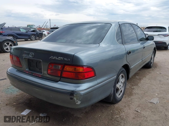 1998 Toyota Avalon XL with VIN 4T1BF18B7WU224978, listed as a IAAI auction lot 41357561 with 306,375 mi miles and . Bid and sale history available at DreamBid. Image 4.