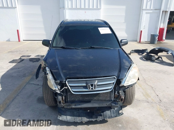 2005 Honda CR-V LX with VIN JHLRD78535C031868, listed as a IAAI auction lot 42002372 with 201,258 mi miles. Bid and sale history available at carsss.com. Image 13.
