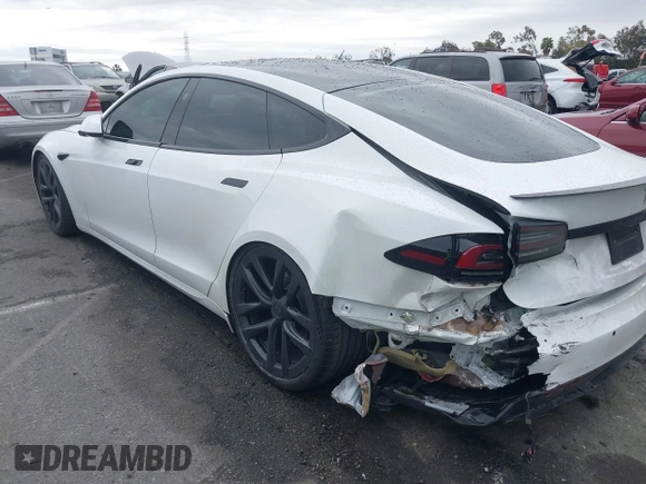 2022 Tesla Model S Plaid with VIN 5YJSA1E65NF488864, listed as a IAAI auction lot 41772788 with 33,915 mi miles and . Bid and sale history available at DreamBid. Image 14.