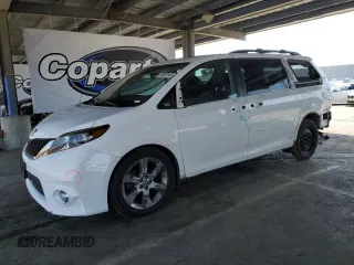 2014 Toyota Sienna SE с VIN 5TDXK3DC7ES451963, выставлен на аукционе Copart как лот 55089145 с пробегом 161 067 миль миль и Списание • Salvage title. История ставок и продаж доступна на DreamBid. Изображение 1.