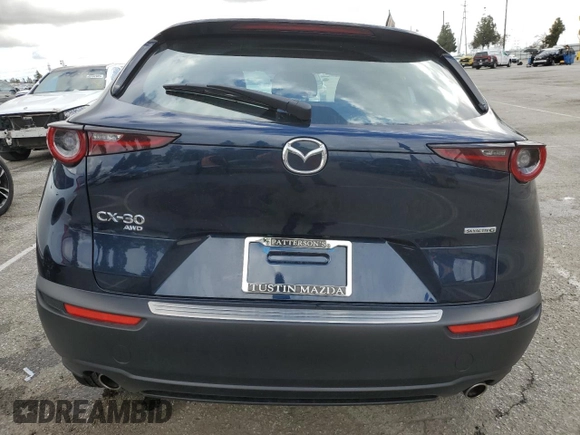 2024 Mazda CX-30 S with VIN 3MVDMBAM5RM655105, listed as a Copart auction lot 45430725 with 10,096 mi miles and Salvage Title. Bid and sale history available at DreamBid. Image 6.