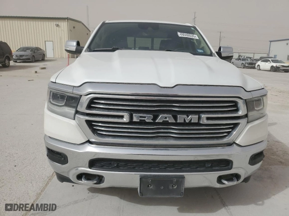 2021 Ram 1500 Laramie with VIN 1C6SRFJT5MN809584, listed as a Copart auction lot 49048035 with 69,411 mi miles and Salvage Title. Bid and sale history available at carsss.com. Image 5.