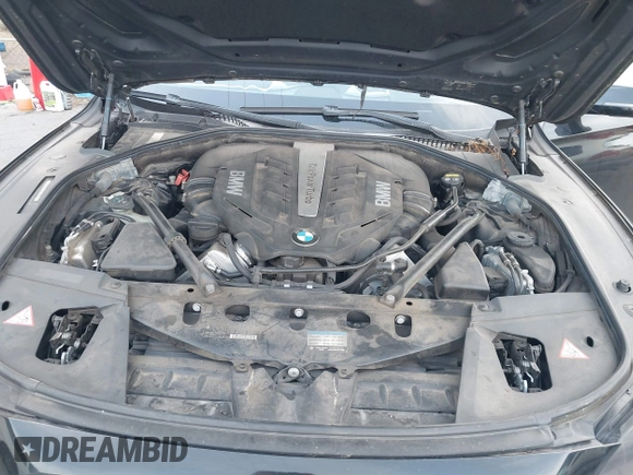 2015 BMW 7 Series 750Li xDrive with VIN WBAYF8C55FD654949, listed as a IAAI auction lot 41659763 with 91,837 mi miles and . Bid and sale history available at carsss.com. Image 10.