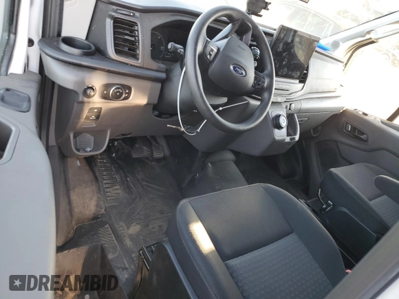 2022 Ford E-Transit Cargo z VIN 1FTBW3XKXNKA30408, wystawiony jako Copart lot #67506013 z przebiegiem 20 228 mil mil oraz . Historia ofert i sprzedaży dostępna na DreamBid. Obrazek 8.