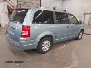 2010 Chrysler Town & Country LX with VIN 2A4RR4DE1AR285996, listed as a IAAI auction lot 42236641 with 165,772 mi miles and . Bid and sale history available at DreamBid. Image 4.