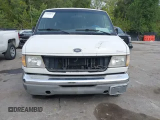 1999 Ford Econoline Cargo with VIN 1FDRE14WXXHB72976, listed as a IAAI auction lot 37688871 with 135,319 mi miles. Bid and sale history available at carsss.com. Image 6.