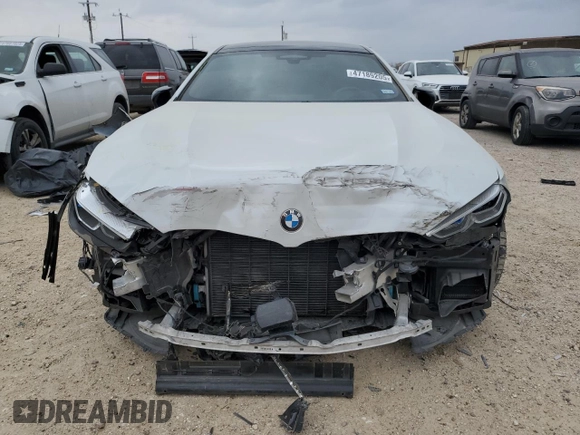 2023 BMW 8 Series M850i z VIN WBAGV8C01PCK29190, wystawiony jako Copart lot #47189205 z przebiegiem 32 691 mil mil oraz Szkoda całkowita • Salvage title. Historia ofert i sprzedaży dostępna na DreamBid. Obrazek 5.