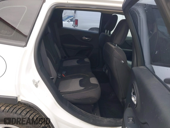 2016 Jeep Cherokee Altitude with VIN 1C4PJLAB8GW108225, listed as a IAAI auction lot 41664092 with 142,588 mi miles and . Bid and sale history available at DreamBid. Image 8.