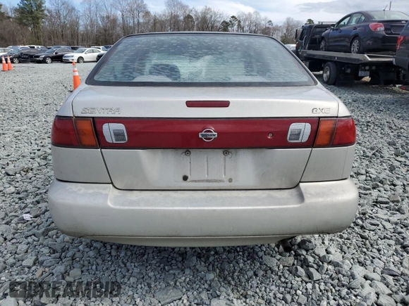 1999 Nissan Sentra XE with VIN 1N4AB41D6XC717640, listed as a Copart auction lot 47634695 with 286,038 mi miles and Salvage title. Bid and sale history available at DreamBid. Image 6.