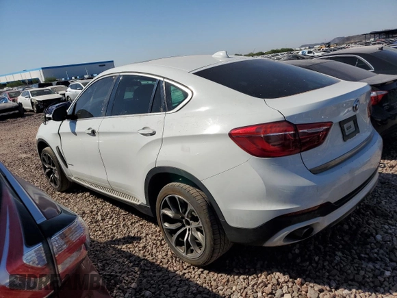 2016 BMW X6 sDrive35i with VIN 5UXKU0C59G0F93163, listed as a Copart auction lot 74148464 with 110,811 mi miles and Salvage Title. Bid and sale history available at carsss.com. Image 2.