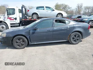 2008 Pontiac Grand Prix z VIN 2G2WP552281113384, wystawiony jako IAAI lot #41989008 z przebiegiem 242 354 mil mil oraz . Historia ofert i sprzedaży dostępna na DreamBid. Obrazek 14.