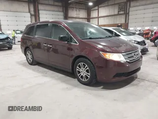 2013 Honda Odyssey EX-L with VIN 5FNRL5H62DB082681, listed as a IAAI auction lot 41971444 with 162,302 mi miles and . Bid and sale history available at carsss.com. Image 1.