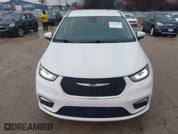2023 Chrysler Pacifica Touring L with VIN 2C4RC1BG6PR520945, listed as a IAAI auction lot 41591128 with 70,351 mi miles and . Bid and sale history available at DreamBid. Image 13.