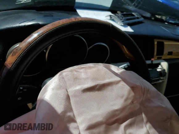 2005 Lexus SC 430 z VIN JTHFN48Y550070001, wystawiony jako Copart lot #49179564 z przebiegiem Nie podano mil oraz Szkoda całkowita • Salvage title. Historia ofert i sprzedaży dostępna na DreamBid. Obrazek 9.