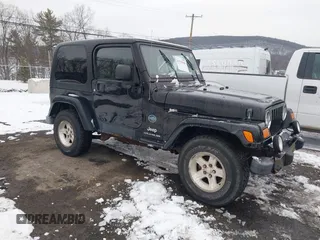 2005 Jeep Wrangler X with VIN 1J4FA39S55P353131, listed as a IAAI auction lot 41575949 with 154,026 mi miles and . Bid and sale history available at DreamBid. Image 1.
