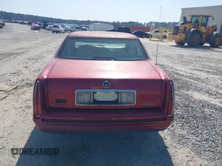 1999 Cadillac DeVille z VIN 1G6KD54Y8XU771788, wystawiony jako IAAI lot #41734590 z przebiegiem 84 302 mil mil oraz . Historia ofert i sprzedaży dostępna na DreamBid. Obrazek 16.