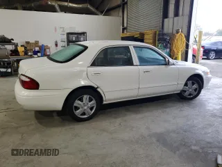 2000 Mazda 626 LX with VIN 1YVGF22D2Y5153254, listed as a Copart auction lot 82841504 with 88,518 mi miles and Clean Title. Bid and sale history available at carsss.com. Image 3.