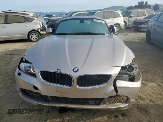 2011 BMW Z4 sDrive30i with VIN WBALM5C5XBE379369, listed as a Copart auction lot 48490475 with 99,425 mi miles and Salvage Title. Bid and sale history available at carsss.com. Image 5.
