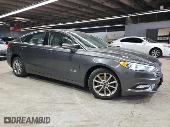 2017 Ford Fusion Titanium z VIN 3FA6P0SU3HR209563, wystawiony jako Copart lot #52039915 z przebiegiem 119 961 mil mil oraz Szkoda całkowita • Salvage title. Historia ofert i sprzedaży dostępna na DreamBid. Obrazek 4.
