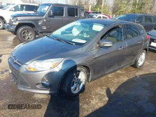 2013 Ford Focus SE with VIN 1FADP3K28DL323879, listed as a IAAI auction lot 41449022 with 133,735 mi miles. Bid and sale history available at carsss.com. Image 2.