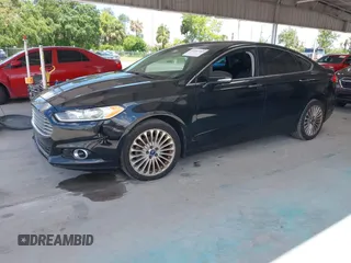2016 Ford Fusion Titanium with VIN 3FA6P0K99GR235692, listed as a IAAI auction lot 42587743 with 169,467 mi miles and . Bid and sale history available at DreamBid. Image 17.