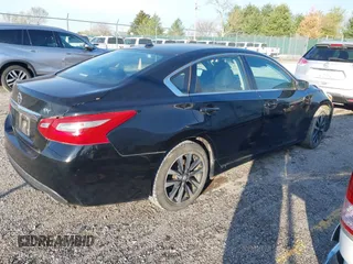 2018 Nissan Altima SV with VIN 1N4AL3AP0JC209978, listed as a IAAI auction lot 41958173 with 104,425 mi miles and . Bid and sale history available at DreamBid. Image 4.