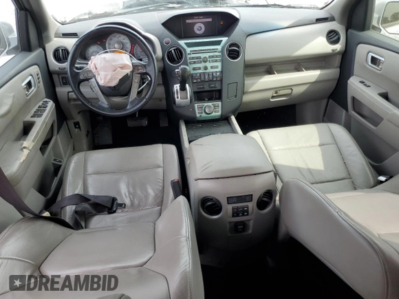 2010 Honda Pilot Touring with VIN 5FNYF3H82AB011212, listed as a Copart auction lot 71115874 with 248,495 mi miles and Salvage Title. Bid and sale history available at DreamBid. Image 8.