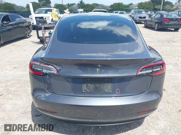 2023 Tesla Model 3 with VIN 5YJ3E1EAXPF575448, listed as a IAAI auction lot 42019288 with 33,859 mi miles and . Bid and sale history available at carsss.com. Image 17.