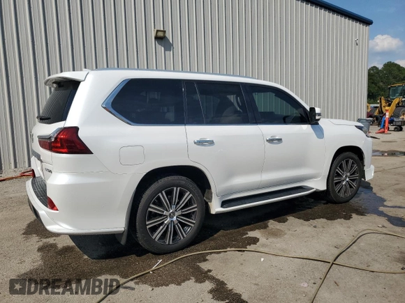 2020 Lexus LX 570 with VIN JTJDY7AX6L4332372, listed as a Copart auction lot 57315675 with 132,418 mi miles and Salvage title. Bid and sale history available at DreamBid. Image 3.