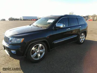 2012 Jeep Grand Cherokee Overland with VIN 1C4RJFCT8CC268410, listed as a IAAI auction lot 41823909 with 205,940 mi miles. Bid and sale history available at carsss.com. Image 14.
