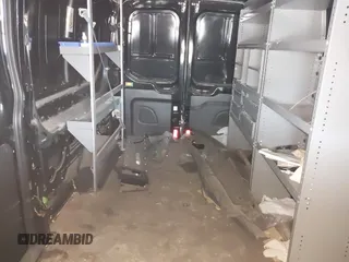 2016 Ford Transit Cargo z VIN 1FTYR2CM0GKB51759, wystawiony jako IAAI lot #41602091 z przebiegiem 158 997 mil mil oraz . Historia ofert i sprzedaży dostępna na DreamBid. Obrazek 8.