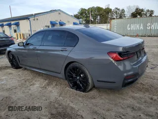 2020 BMW 7 Series 740i with VIN WBA7T2C06LCD15613, listed as a Copart auction lot 42206705 with 76,520 mi miles and Salvage Title. Bid and sale history available at carsss.com. Image 2.
