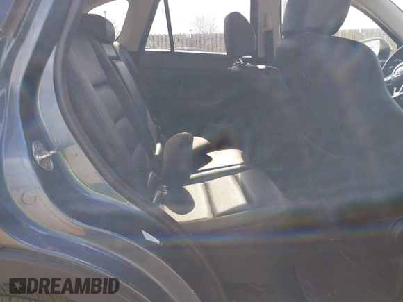 2015 Mazda CX-5 Grand Touring with VIN JM3KE4DY5F0469098, listed as a IAAI auction lot 41858792 with 174,883 mi miles. Bid and sale history available at carsss.com. Image 8.