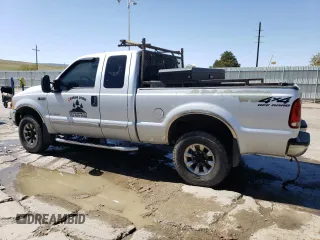2001 Ford F-250 XL with VIN 1FTNX21F11ED05348, listed as a Copart auction lot 52098155 with 217,678 mi miles and Salvage Title. Bid and sale history available at DreamBid. Image 2.