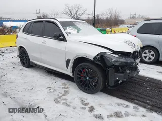 2025 BMW X5 M60i with VIN 5UX33EU03S9X72579, listed as a IAAI auction lot 41502125 with 7,167 mi miles. Bid and sale history available at carsss.com. Image 1.
