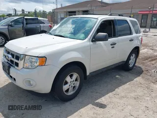 2012 Ford Escape XLT z VIN 1FMCU9DG2CKB18584, wystawiony jako IAAI lot #42469881 z przebiegiem 166 469 mil mil oraz . Historia ofert i sprzedaży dostępna na DreamBid. Obrazek 2.