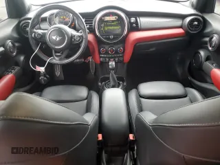 2017 MINI Hardtop 4 Door Cooper with VIN WMWXU1C30H2E19304, listed as a Copart auction lot 51008575 with 34,526 mi miles and Salvage Title. Bid and sale history available at DreamBid. Image 8.