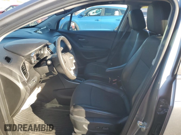 2020 Chevrolet Trax LT z VIN 3GNCJLSB7LL321218, wystawiony jako Copart lot #79774344 z przebiegiem Nie podano mil oraz Szkody całkowita. Historia ofert i sprzedaży dostępna na DreamBid. Obrazek 7.
