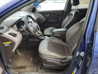 2010 Hyundai Tucson GLS with VIN KM8JU3AC9AU113714, listed as a Copart auction lot 55263765 with 193,175 mi miles and Salvage Title. Bid and sale history available at DreamBid. Image 7.