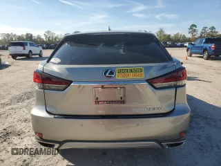 2022 Lexus RX with VIN 2T2JZMAA8NC256470, listed as a Copart auction lot 82873304 with 14,614 mi miles and Salvage Title. Bid and sale history available at carsss.com. Image 6.