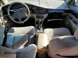 1999 Buick Regal LS with VIN 2G4WB52K4X1458845, listed as a Copart auction lot 55254814 with 200,000 mi miles and Salvage title. Bid and sale history available at DreamBid. Image 8.