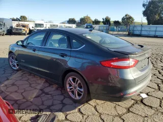 2015 Ford Fusion SE Hybrid with VIN 3FA6P0LU4FR213570, listed as a Copart auction lot 82136224 with 148,524 mi miles and Salvage Title. Bid and sale history available at carsss.com. Image 2.