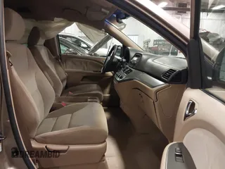 2006 Honda Odyssey LX with VIN 5FNRL38256B113667, listed as a IAAI auction lot 41856860 with 142,031 mi miles. Bid and sale history available at carsss.com. Image 5.