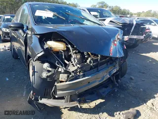 2015 Ford Fiesta S with VIN 3FADP4AJ6FM207628, listed as a IAAI auction lot 41847859 with 221,538 mi miles. Bid and sale history available at carsss.com. Image 6.