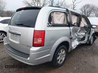 2010 Chrysler Town & Country Touring with VIN 2A4RR5D14AR293299, listed as a IAAI auction lot 41184584 with 245,928 mi miles. Bid and sale history available at carsss.com. Image 4.