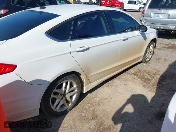 2015 Ford Fusion SE z VIN 3FA6P0H7XFR200759, wystawiony jako IAAI lot #42112951 z przebiegiem 233 652 mil mil oraz . Historia ofert i sprzedaży dostępna na DreamBid. Obrazek 4.