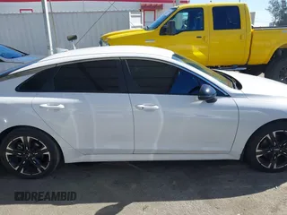 2023 Kia K5 GT-Line z VIN 5XXG64J22PG224092, wystawiony jako IAAI lot #41652803 z przebiegiem 50 326 mil mil oraz . Historia ofert i sprzedaży dostępna na DreamBid. Obrazek 14.